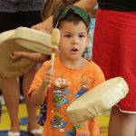 Young Child Playing Drum
