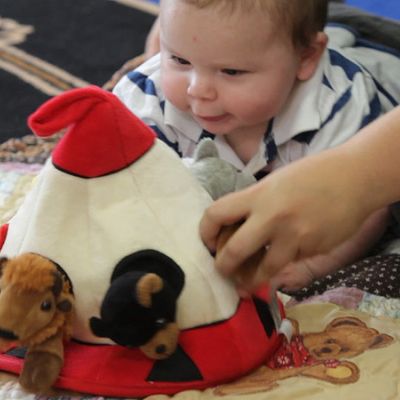 Baby playing with Teepee